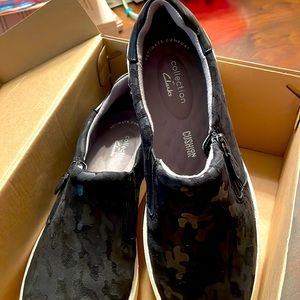 Clark’s comfortable slip on ultimate collection shoes. Never worn, too big